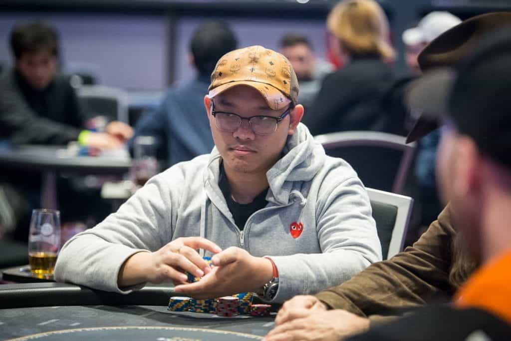 Thai Ha sat at the poker table with his stack in shot.